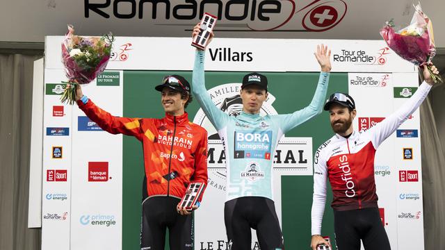 Le podium final du Tour de Romandie: Vlasov (au centre), Mäder (à gauche) et Geschke (à droite). [Jean-Christophe Bott]