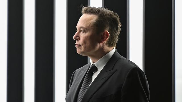 Elon Musk photographié en mars 2022 lors de l'ouverture du usine Tesla en Allemagne. [DPA/Keystone - Patrick Pleul]