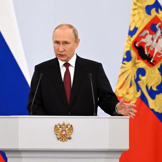 Vladimir Poutine lors de son discours vendredi au Kremlin. [Keystone - Gavriil Grigoro, Sputnik, Kremlin Pool Photo]