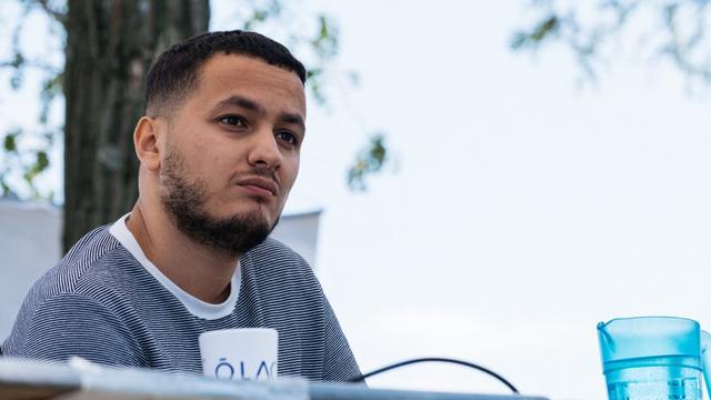 Taha Bouhafs, jeune étoile montante du militantisme de la gauche radicale. [Hans Lucas/AFP - Ugo Padovani]