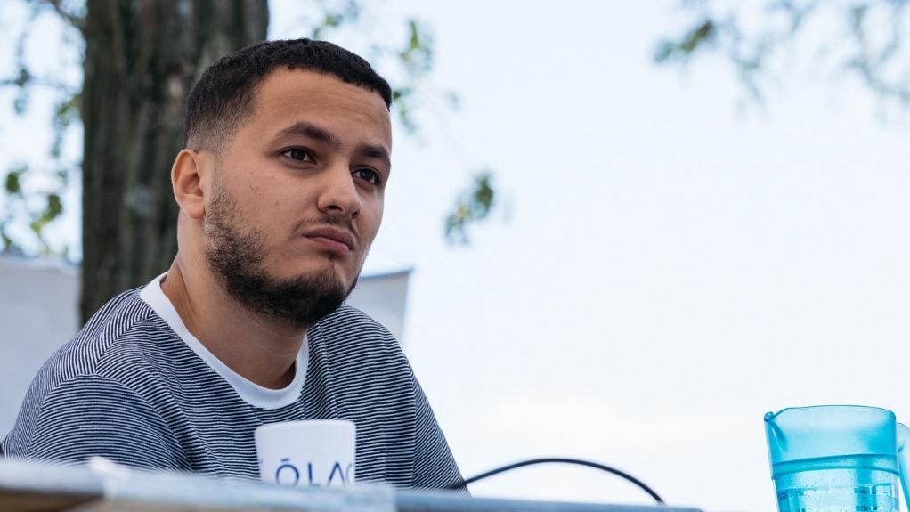 Taha Bouhafs, jeune étoile montante du militantisme de la gauche radicale. [Hans Lucas/AFP - Ugo Padovani]