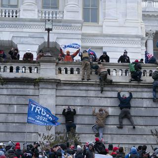 En cas de réélection, Donald Trump envisage de gracier des assaillants du Capitole. [Keystone/AP - Jose Luis Magana]