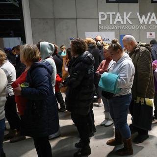 L'afflux de réfugiés ukrainiens en Pologne fait craindre au polonais de subir le même sort si le conflit se propage. [EPA - Rafal Guz - Keystone]