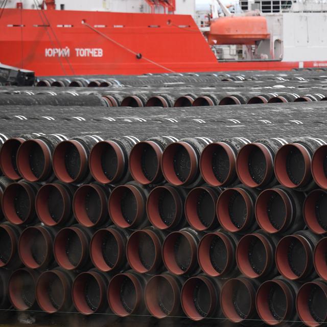 Des tuyaux destinés à la construction du gazoduc Nord Stream 2 en janvier 2021. [Keystone/DPA - Stefan Sauer]