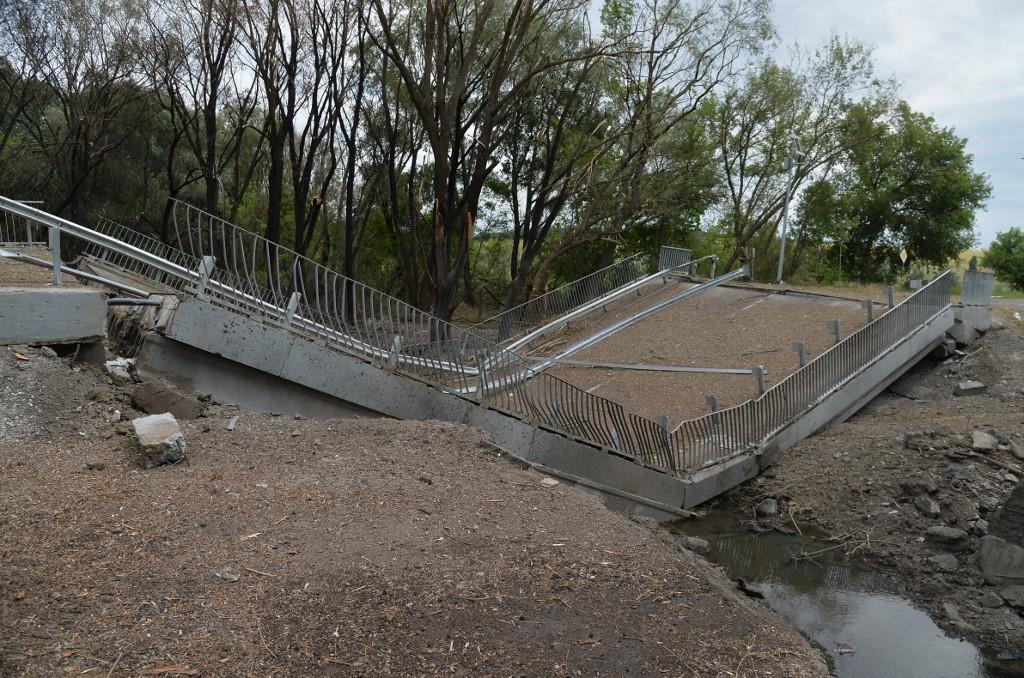 Un pont détruit à l'entrée de Lyssytchansk. [afp - Viktor Antonyuk / Sputnik]