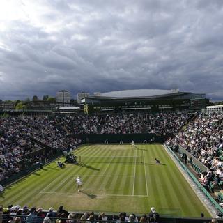 Le tournoi de Wimbledon connaîtra ce soir tous ses participants aux huitièmes de finale. [AP Photo - Kirsty Wigglesworth]