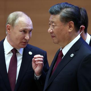 Vladimir Poutine et Xi Jinping se sont retrouvés lors du sommet de l’OCS en Ouzbékistan en septembre. [Keystone - Sergei Bobylev]