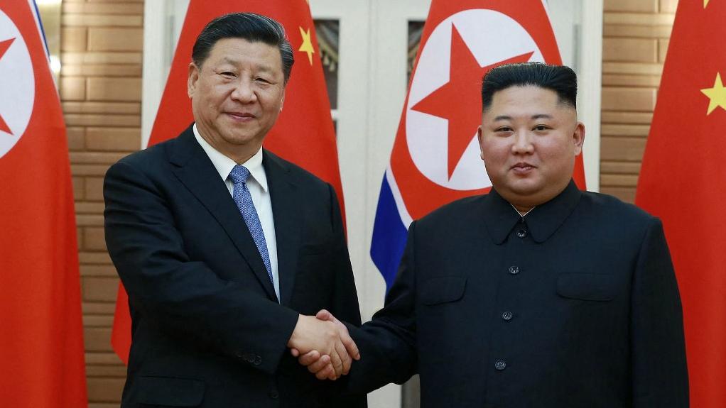 Xi Jinping et Kim Jong Un à Pyongyang, 21.06.2019. [Korean Central News Agency/AFP]