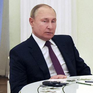 Vladimir Poutine en février 2022. [Kremlin Pool Photo/Keystone - Mikhail Klimentyev]