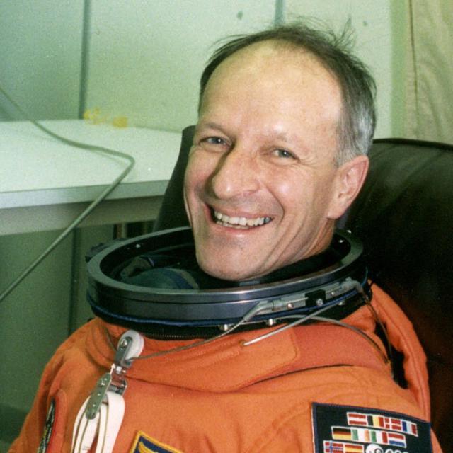 Claude Nicollier au Centre spatial Kennedy en Floride (USA), peu avant son premier vol spatial réussi en août 1992. [KEYSTONE/AP/NASA/Str]
