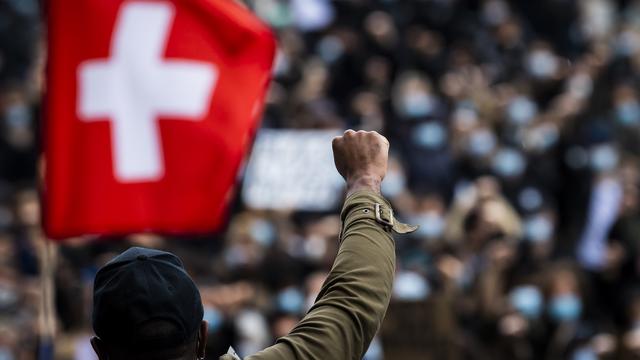 "Malentendus" dénoncés après des critiques de l'ONU sur le racisme systémique en Suisse. [Keystone - Jean-Christophe Bott]