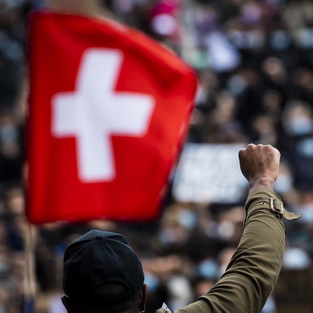 "Malentendus" dénoncés après des critiques de l'ONU sur le racisme systémique en Suisse. [Keystone - Jean-Christophe Bott]