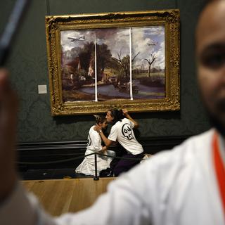 Pourquoi les activistes climatiques ciblent-ils les oeuvres d'art des musées? [AFP - CARLOS JASSO]