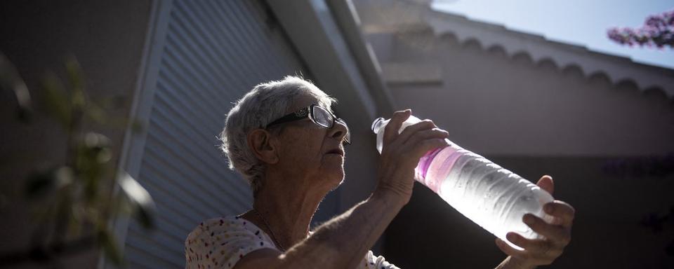 Boire est essentiel en période de canicule. [afp - Magali Cohen]