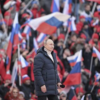 Le président Vladimir Poutine lors de l'événement de commémoration de l'annexion de la Crimée. [EPA/Keystone - Ramil Sitdjikov]