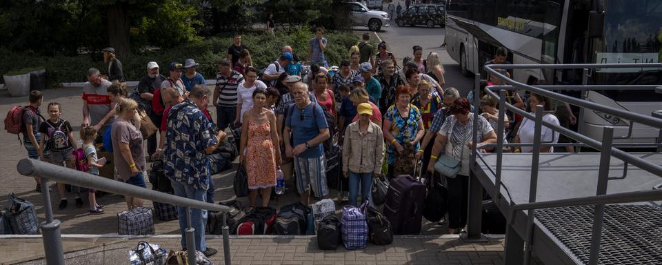 Les cantons sont sous pression pour accueillir des réfugiés ukrainiens à l'approche de l'automne. [AP Photo - Nariman El-Mofty]