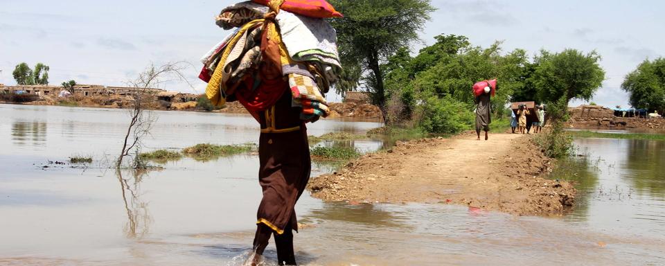 Plus de 33 millions de personnes ont été affectées par les inondations au Pakistan. [Keystone - Waqar Hussain]