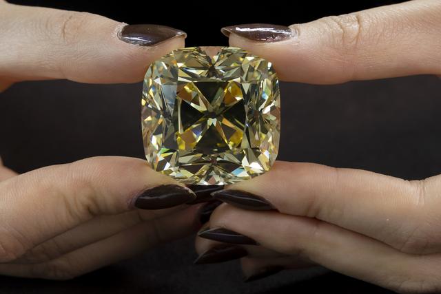 Le diamant jaune canari "Red Cross". [Keystone - Salvatore Di Nolfi]