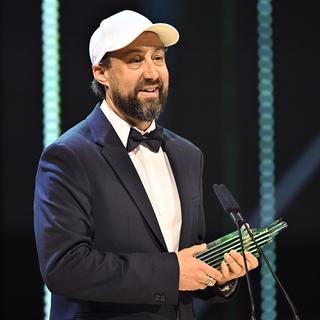 Le réalisateur genevois Frédéric Baillif à la cérémonie du Prix du cinéma suisse. [Keystone - Walter Bieri]