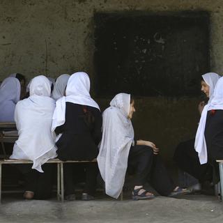 Des filles afghanes à l'école. [Keystone - AP Photo/Anja Niedringhaus]