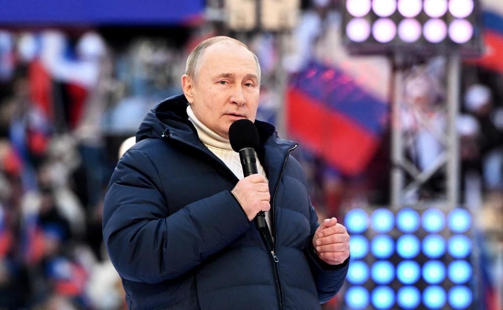Vladimir Poutine au stade Luzhniki de Moscou, 18.03.2022. [Sputnik / Sputnik/AFP - Sergey Guneev]