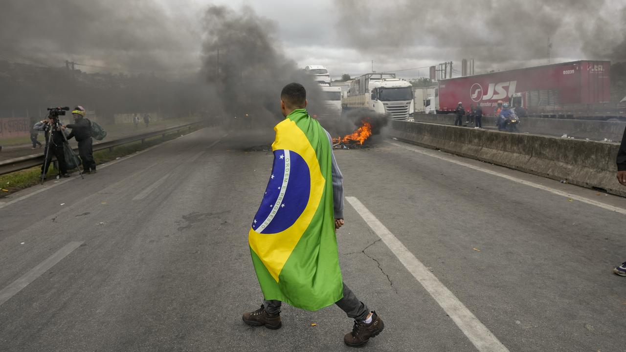 Le président brésilien sortant Jair Bolsonaro a demandé mercredi à ses partisans de "débloquer les routes". [Keystone - Andre Penner]