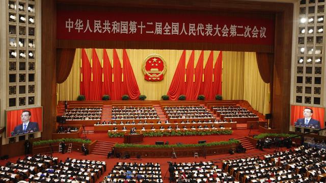 Des délégués et des officiels se rassemblent pour la deuxième session du 12e Congrès national des peuples (CNP) au Grand Hall du Peuple à Pékin, en Chine, le 5 mars 2014. [EPA/Keystone - Rolex Dela Pena]