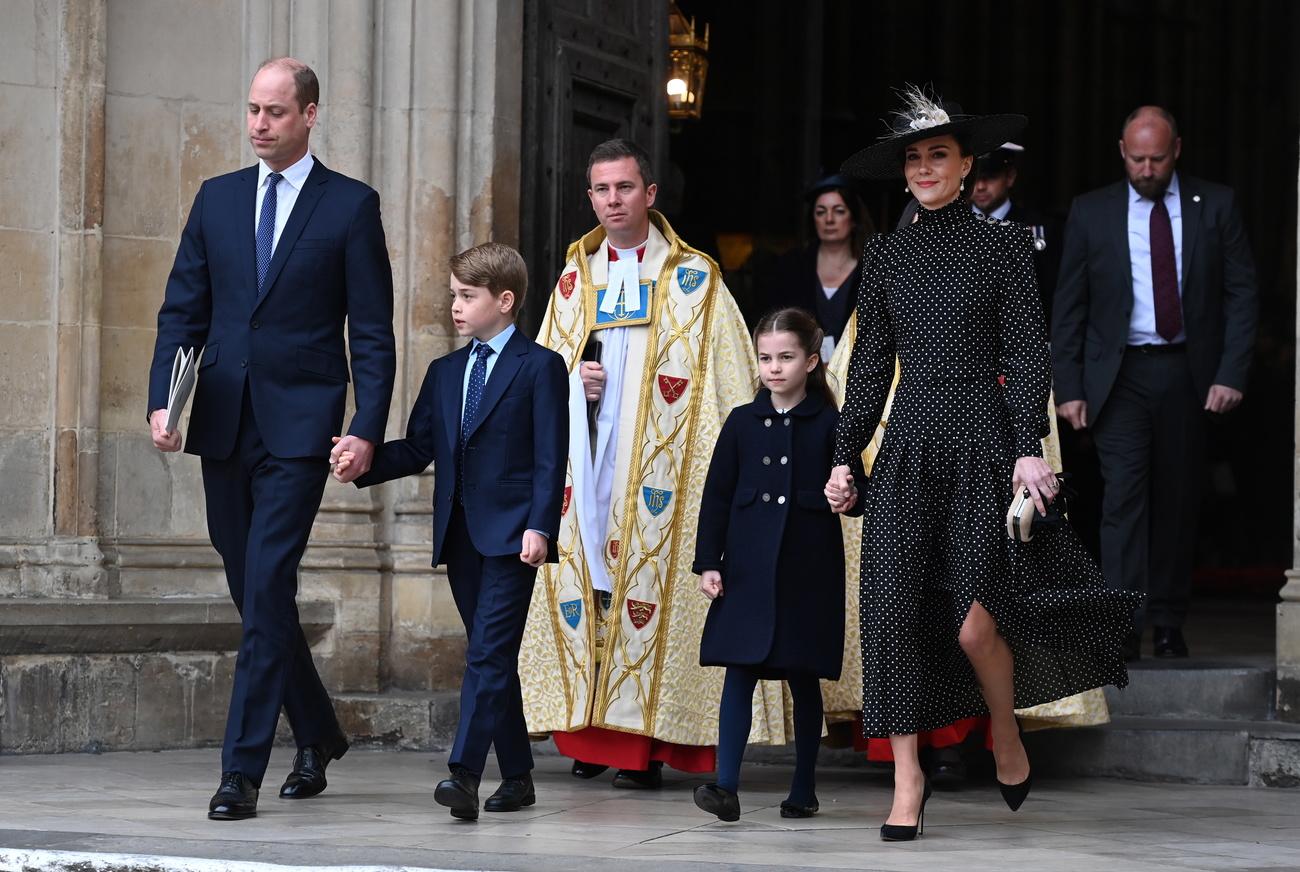 Le duc et la duchesse de Cambridge, le prince William, et Catherine, ainsi que leurs enfant la princesse Charlotte et le prince George, lors de l'hommage au prince Philip, le 29 mars 2022. [KEYSTONE - ANDY RAIN]