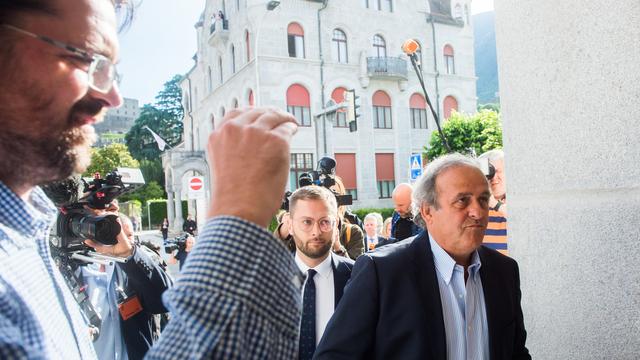 L'ancien président de l'UEFA Michel Platini à son arrivée au tribunal. [Keystone/Ti-Press - Alessandro Crinari]