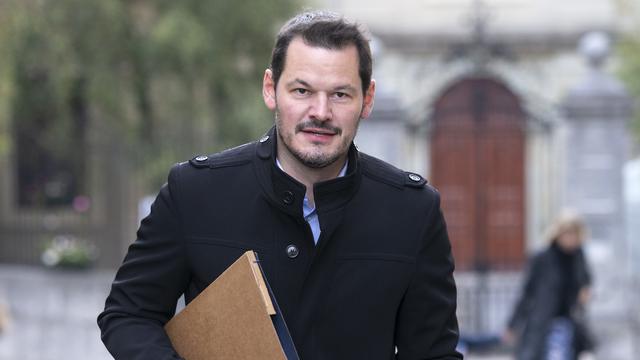 Pierre Maudet, ancien conseiller d'Etat genevois, arrive au palais de justice pour l'ouverture de son procès devant la Chambre pénale d'appel et de révision de Genève, le 11 octobre 2021. [KEYSTONE - Salvatore Di Nolfi]