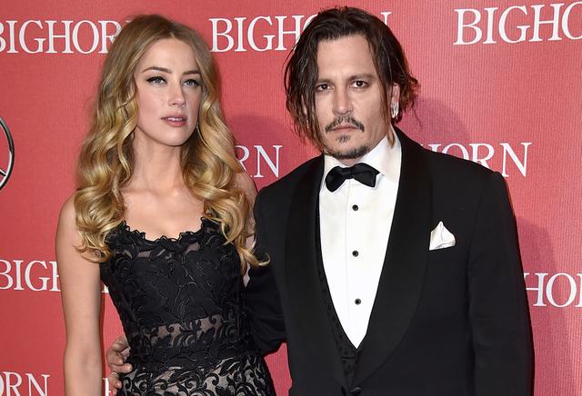 Amber Heard et Johnny Depp en janvier 2016. [Keystone - ordan Strauss/Invision/AP]