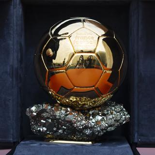 L'élection du Ballon d'Or sera "plus lisible" selon le rédacteur en chef de France Football. [Keystone - Kamil Zihnioglu]