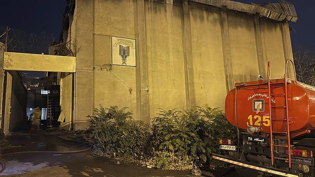 Une photo fournie par l'Agence de presse de la République islamique, IRNA, montre un bâtiment carbonisé après un incendie à la prison d'Evin, à Téhéran, le 16 octobre 2022. [Keystone - IRNA via AP]