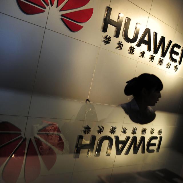 Huawei avait déjà été soumise à des règles équivalentes par le passé aux Etats-Unis. [AP/Keystone]