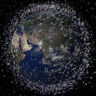 Une vue d'artiste sur la Terre et ses satellites. [AP Photo/Keystone - ESA]