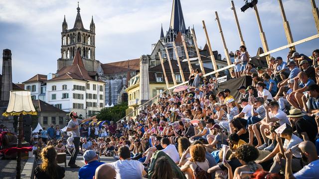 Plus de 100'000 festivaliers pour la 50e du Festival de la Cité. [Keystone - Jean-Christophe Bott]