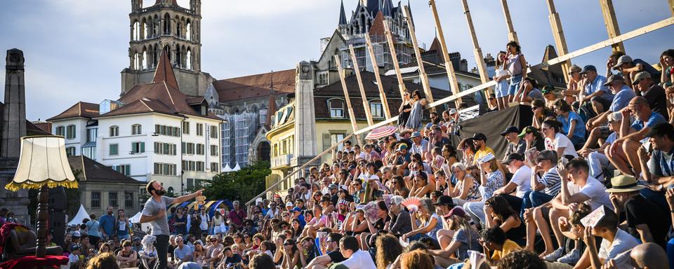 Plus de 100'000 festivaliers pour la 50e du Festival de la Cité. [Keystone - Jean-Christophe Bott]