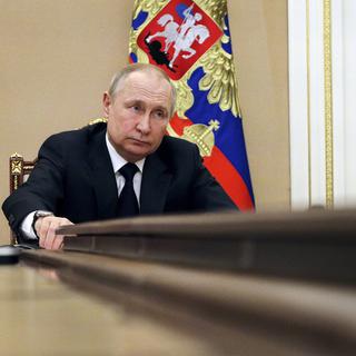 Le président Poutine au Kremlin le 10 mars 2022. [Keystone - Mikhail Klimentyev / AP Photo]