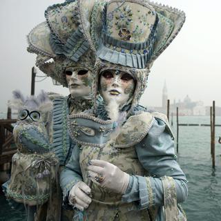 Des participants masqués au carnaval de Venise 2016. [EPA/Keystone - Andrea Merola]