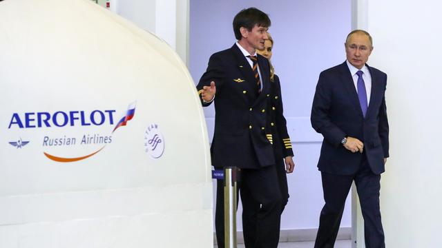 Le président russe Vladimir Poutine lors d'une visite au centre de formation aéronautique de PJSC Aeroflot le 05 mars 2022. [Keystone - EPA/MIKHAEL KLIMENTYEV/SPUTNIK/KREMLIN]