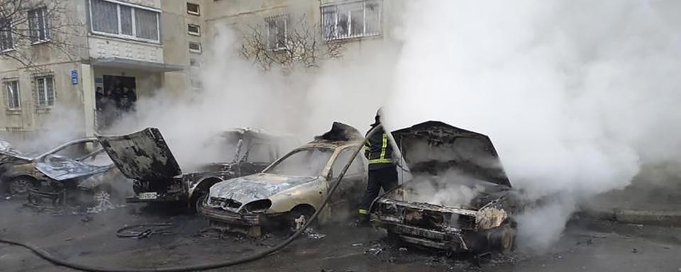 Quartier résidentiel bombardé à Kharkiv, 28.02.2022. [Ukraine State Emergency Press Service/EPA/Keystone]