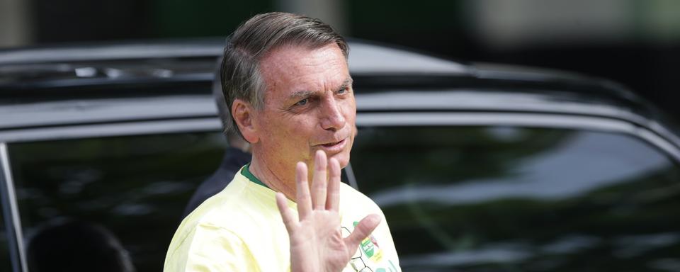 Le président sortant Jair Bolsonaro au moment de voter pour le 2ème tour de la présidentielle brésilienne. [EPA/Keystone - Andre Coelho]