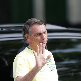 Le président sortant Jair Bolsonaro au moment de voter pour le 2ème tour de la présidentielle brésilienne. [EPA/Keystone - Andre Coelho]