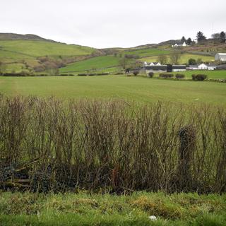 Vue du comté de Newry, en Irlande du Nord, à la frontière avec la République d'Irlande. [EPA/Keystone - Neil Hall]