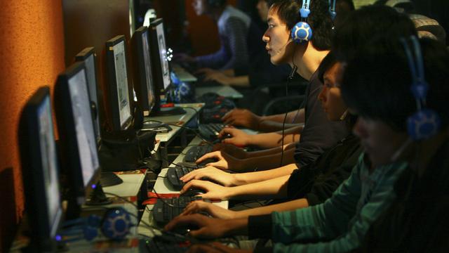 Un cybercafé dans la ville Fuyang dans le centre de la Chine. [Keystone - AP Photo]