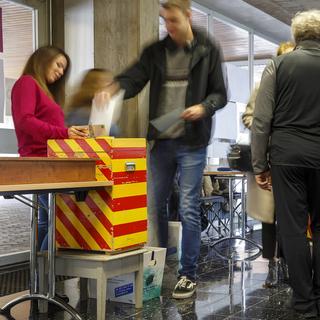 Un local de vote dans le canton de Genève, le 20 octobre 2019. [Keystone - Salvatore Di Nolfi]