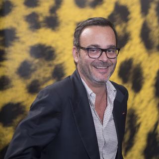 Le producteur de film suisse Michel Merkt, lors d'une séance de photographie au Festival de Locarno. [Keystone - Urs Flueeler]