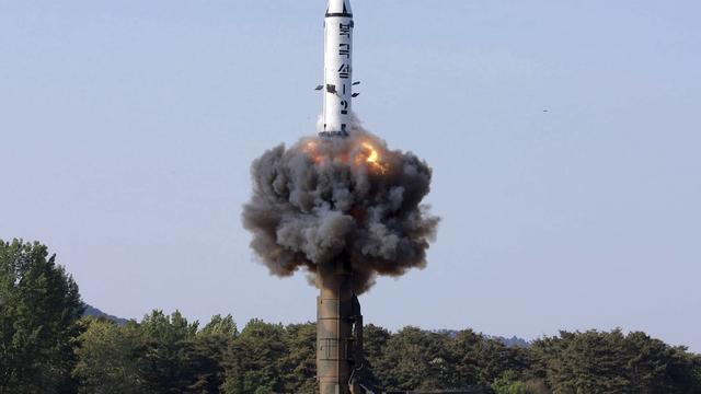 Un missile nord coréen qui décolle. [Korea News Service via AP/ Keystone - Korean Central News Agency]