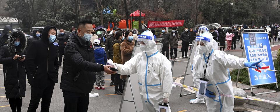 Un centre de test dans la ville de Xi'an en Chine. [AP/Keystone - Liu Xiao]