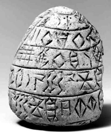 Inscription en élamite linéaire, sur un cône en terre cuite, probablement vers 2300 avant Jésus-Christ. [Archéorient - François Desset]